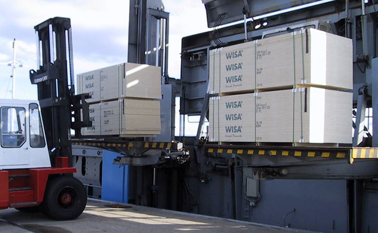 Handling of Forest Products: Forklift loading forestry products onto an inland vessel Handling of Forest Products: Forklift loading forestry products onto an inland vessel